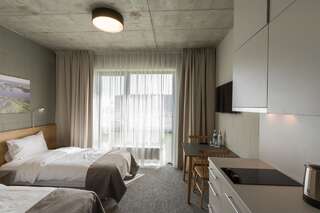 Отель Air Hotel Кармелава Улучшенный двухместный номер с 2 отдельными кроватями-1